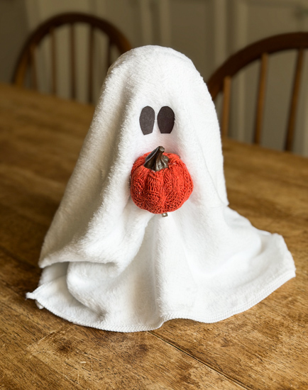 DIY Ghost Halloween Decor made from dollar store supplies is an easy Halloween craft that takes minutes to make and looks adorable in any Halloween display.