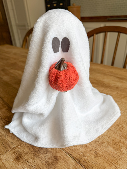 DIY Ghost Halloween Decor made from dollar store supplies is an easy Halloween craft that takes minutes to make and looks adorable in any Halloween display.