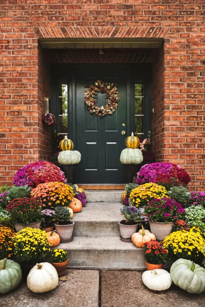 Fall Porch Decorating Ideas for every type of space! Get inspiration for front, small, back, screened, and three-season porches with cozy fall decor ideas.