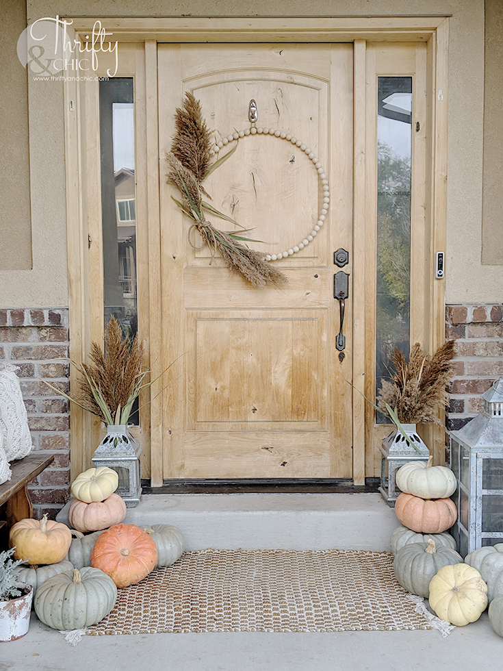 Fall Porch Decorating Ideas for every type of space! Get inspiration for front, small, back, screened, and three-season porches with cozy fall decor ideas.