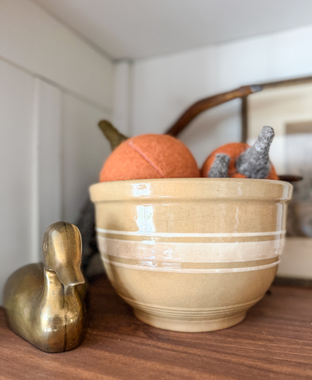 Vintage fall decor ideas using thrifted finds, warm fall colors, and vintage-inspired pieces. Learn how to create a cozy, collected fall home.