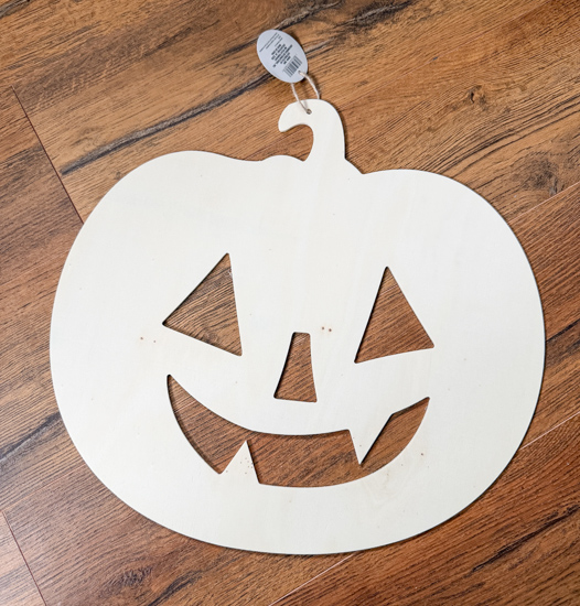 Create vintage Halloween wall decor with inexpensive Dollar Tree pumpkin cutouts and paint. See how easy it is to get the vintage look for less.